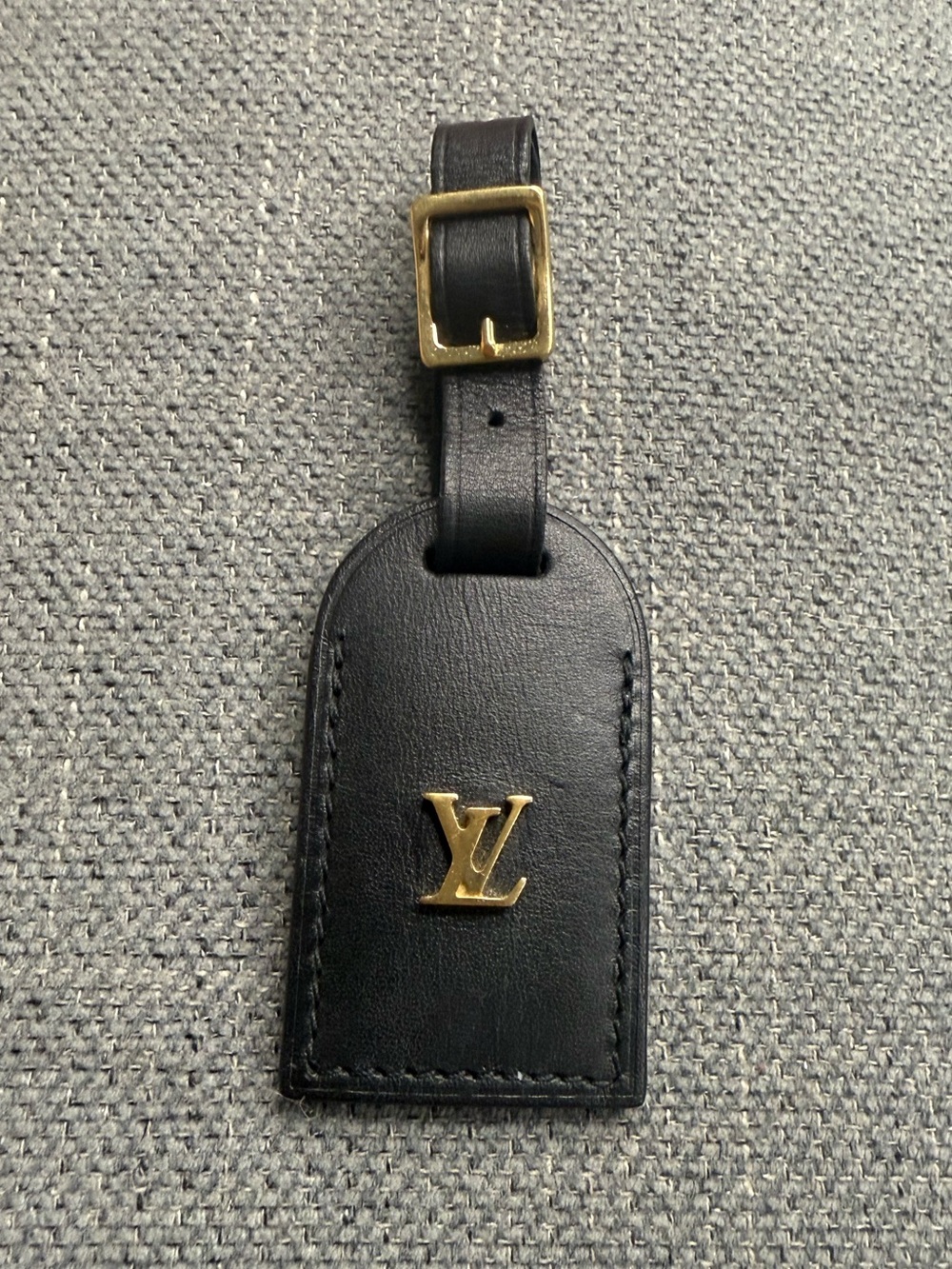 Louis Vuitton LV plate leather charm name tag